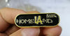 HomeLAnd Gold Metal Pin